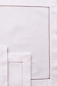 Tischset Toscana aus weißer Baumwolle mit handgesticktem Hohlsaum