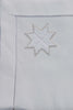 Weihnachtsserviette aus Baumwolle von LINDHORST mit handgesticktem Stern mit silberner Umrandung und Hohlsaum Abschluss -Stoffservietten Weihnachtsstern silber auf Deutsch.